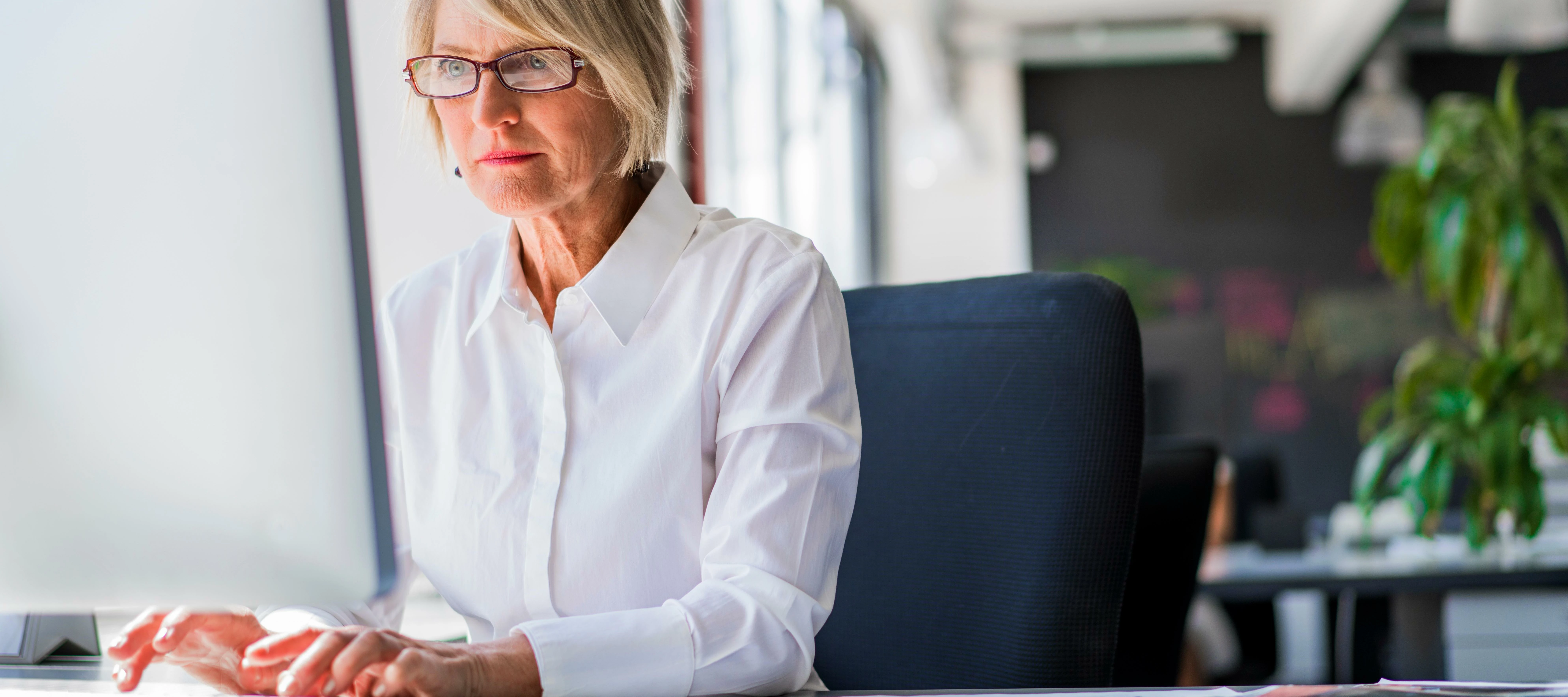 Woman typing on computer learning
