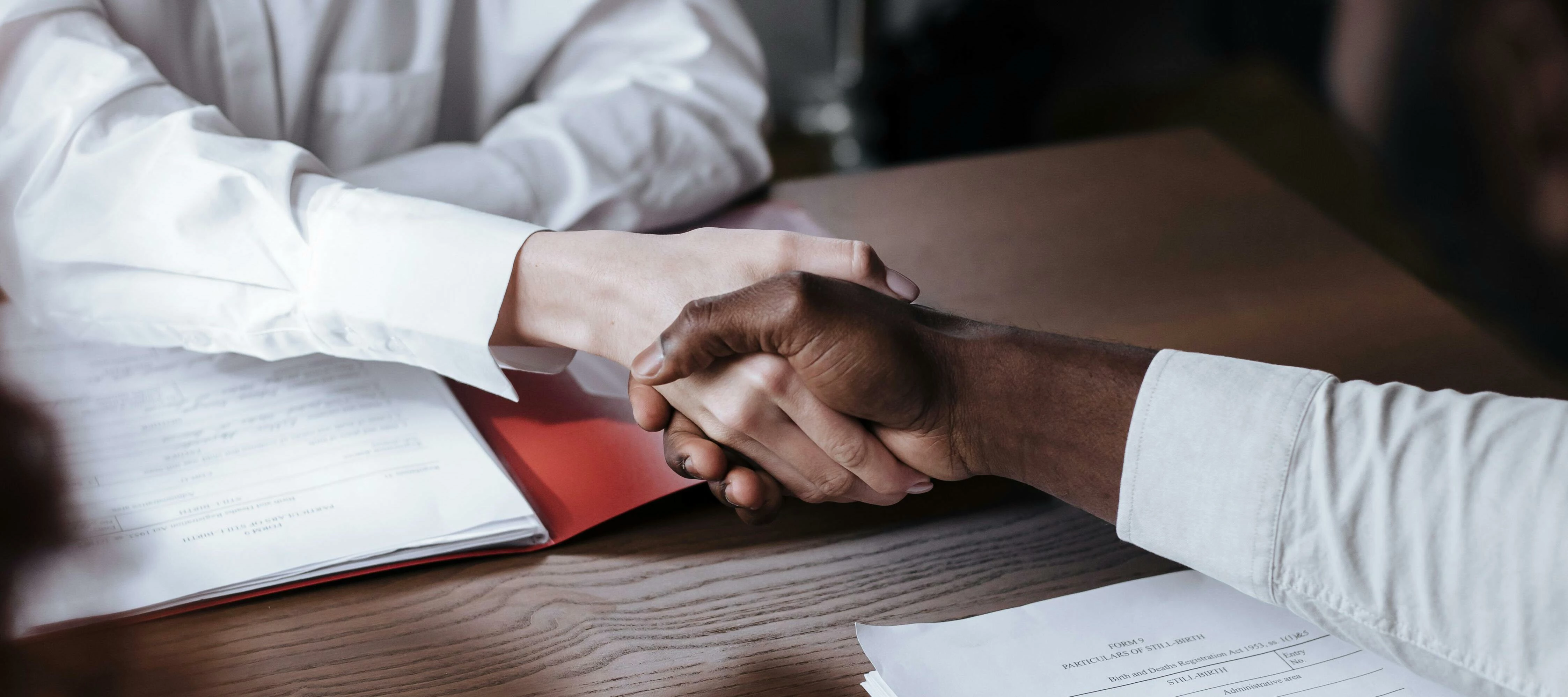 two people shaking hands