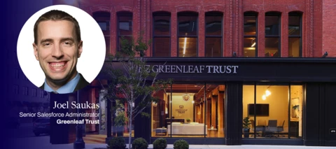 joel saukas headshot on Greenleaf Trust building