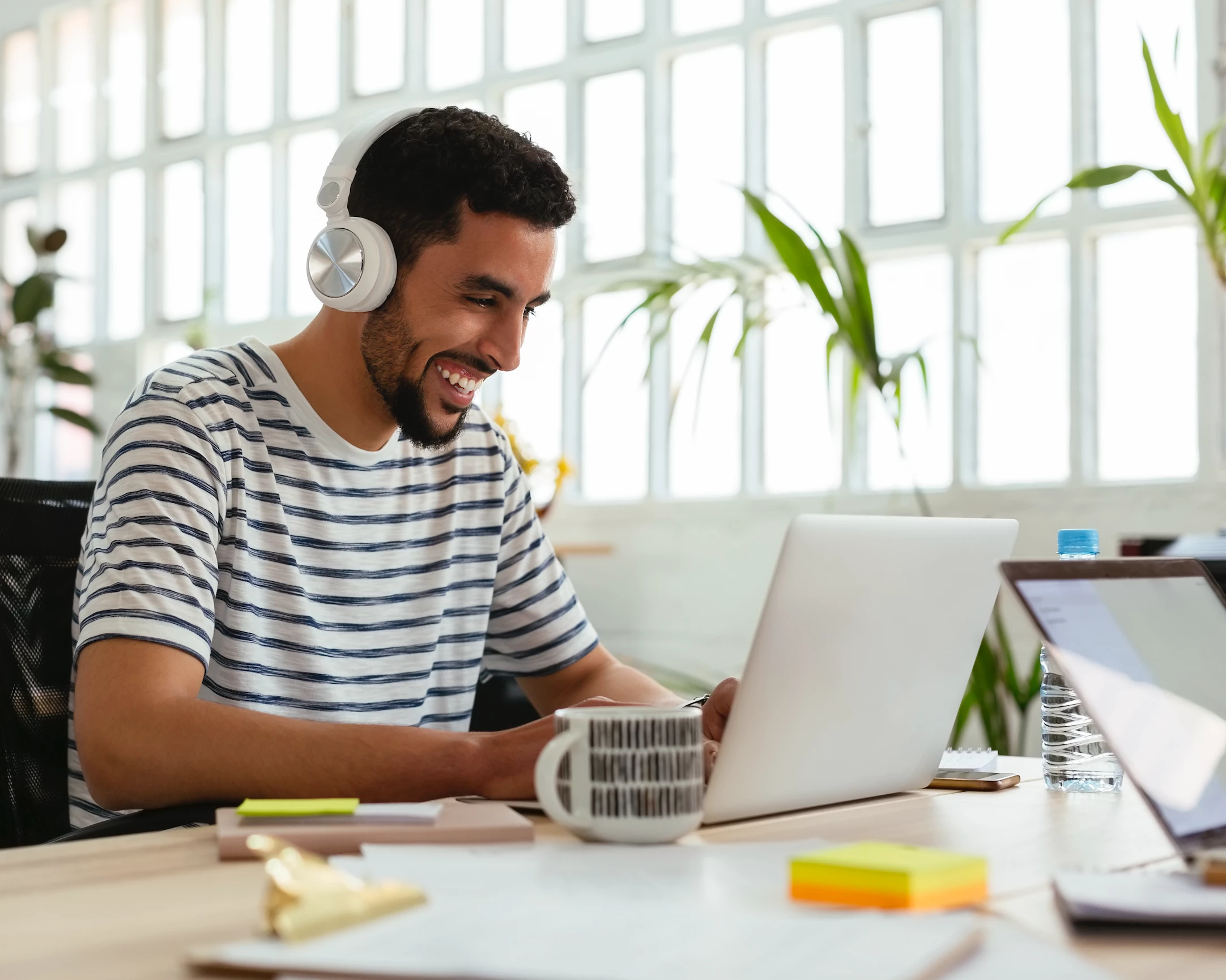 Excited user at laptop